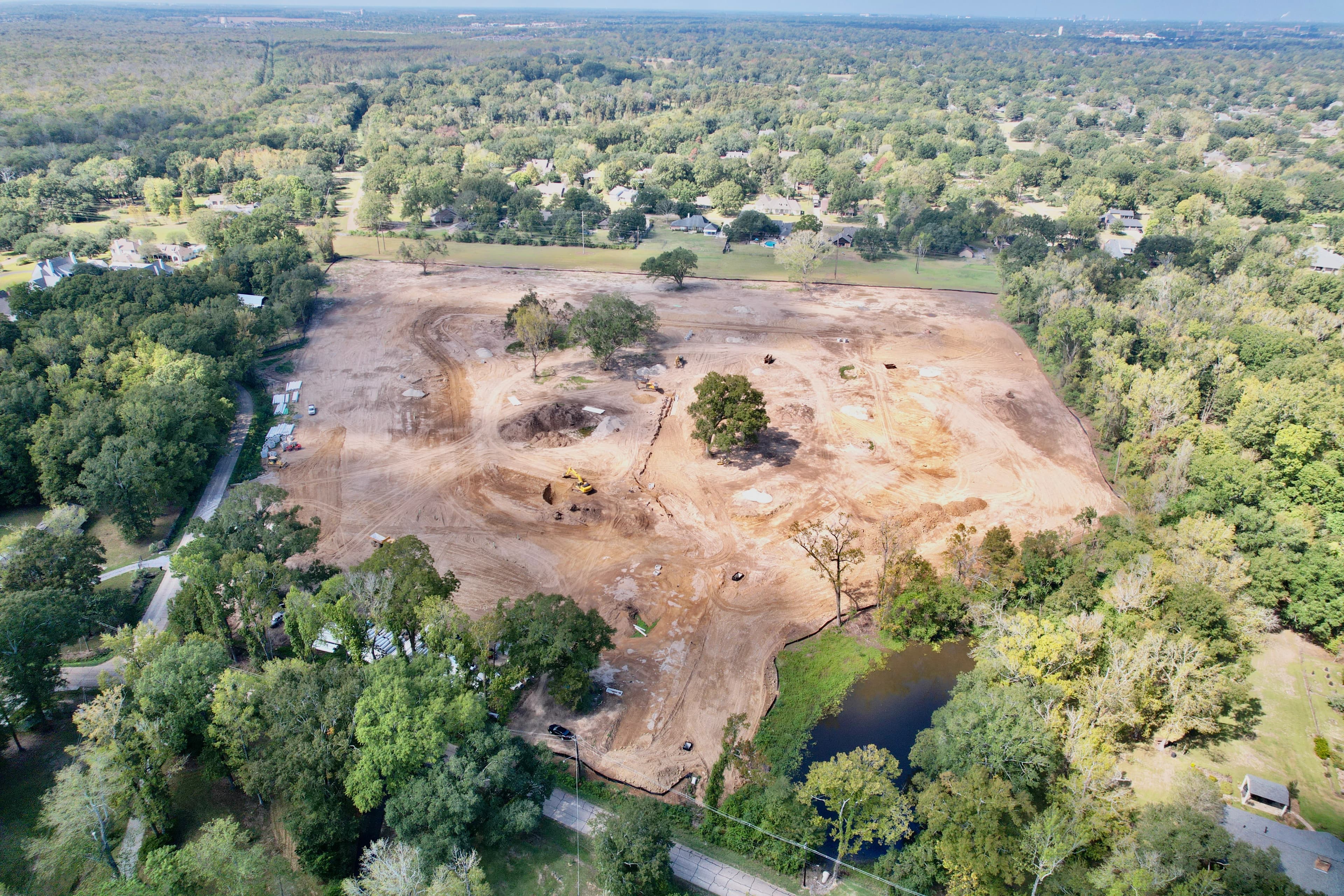 Initial land clearing and preparation begins